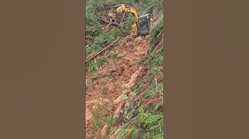 An excavator encountered a mud-slipping hazard while working on a steep slope.