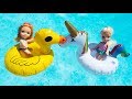Elsa And Anna Toddlers Have Fun In The Swimming Pool 