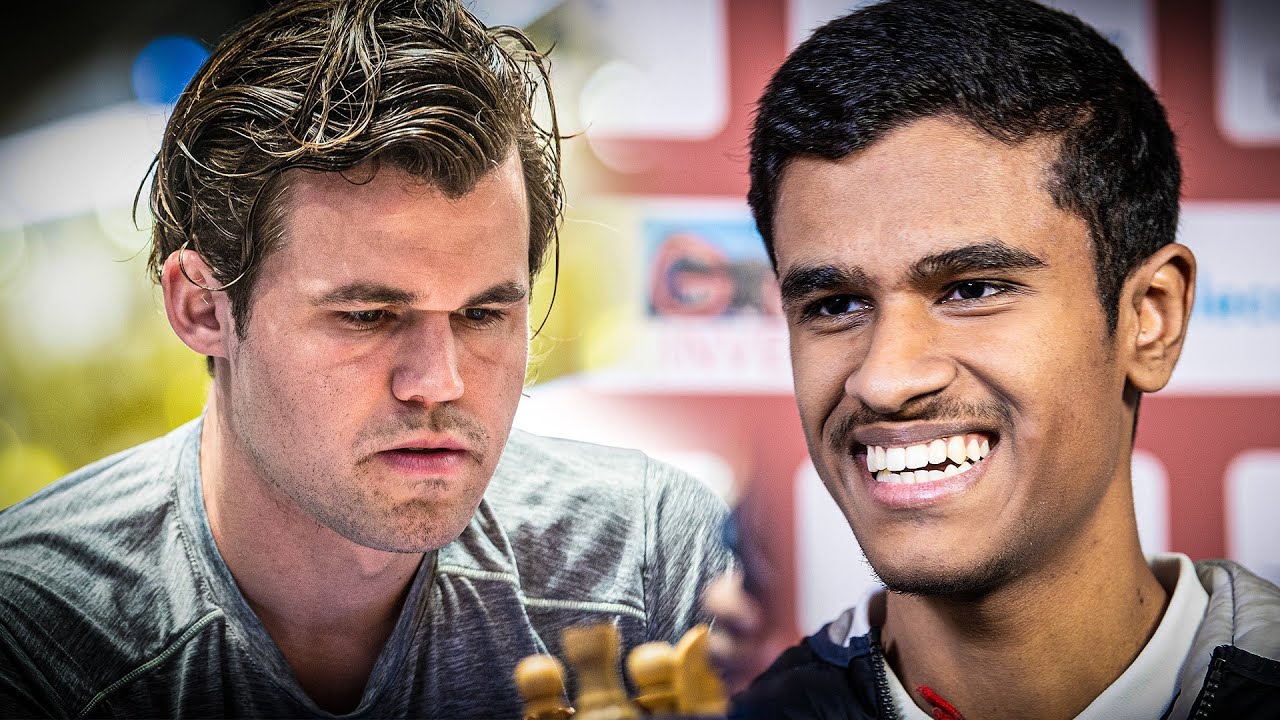 Carlsen jumps in standings with win, Qatar's Aziz plays out draw