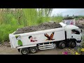 DUA MOBIL TRUK TRIBAL TRINTON RC MUATAN PASIR MELEWATI JALAN BANJIR PENUH LUMPUR - MINIATUR TRUCK