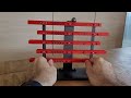 3D printed skill game with a ball and cascading rails