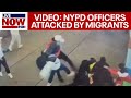 Nypd officers attacked by 5 migrant men in times square  livenow from fox