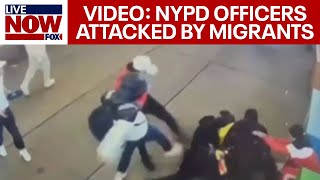 NYPD officers attacked by 5 migrant men in Times Square | LiveNOW from FOX