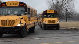 School Buses Leaving Romulus Middle School