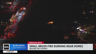 Small brush fire burning near homes in Rolling Hills Estates