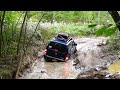 Two Xterras Offroading in the Forest