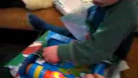 Tyler opening Maryann's present