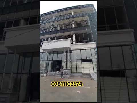 تنفيذ واجهة مبنى في بابل كاسيت دبل زجاج حراري مع مقطع المنيوم تركي 