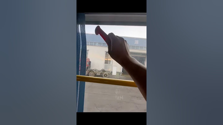 How to break glass on a bus?