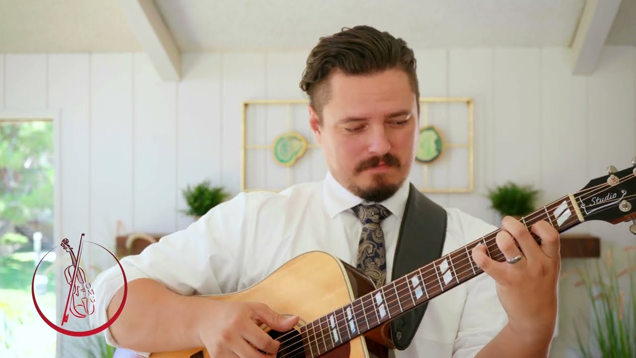Lyle Performing In A Sentimental Mood On Solo Guitar