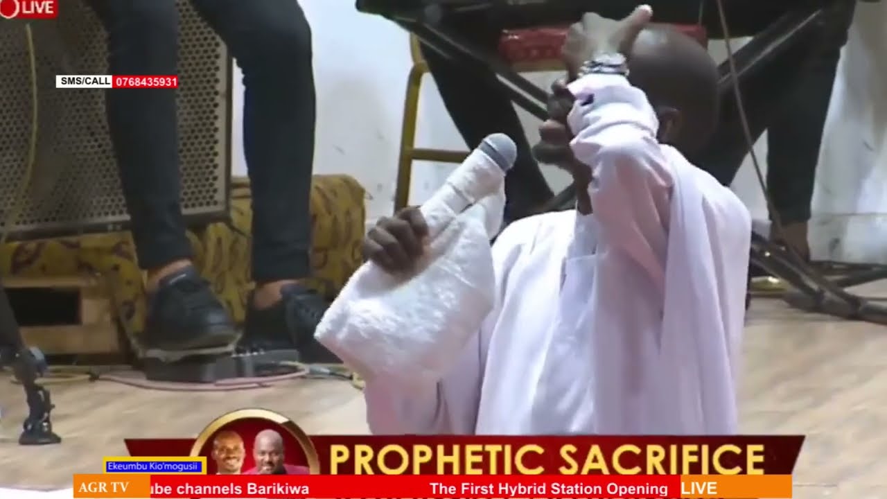 PASTOR EZEKIEL GETS EMOTIONAL AS HE SINGS HIS FAVORITE SONG AT MAXIMUM MIRACLE CENTER.