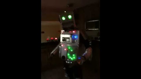 Cardboard Robot Costume with wired switches and buttons