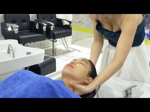 Relaxing shampoo and massage face with beautiful girl in Cali Nguyen Hair Salon