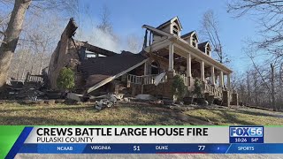 Several Pulaski County crews work together to put out large house fire