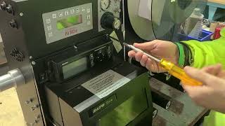 Removing and Installing a Print Engine Module in a Print-and-Apply Labeling System