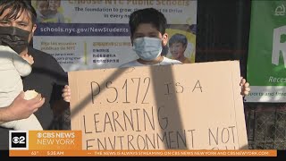 Parents continue to protest housing asylum seekers in schools