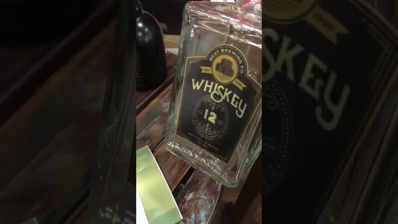 ETICHETTE CON FORME PARTICOLARI PER LIQUORI