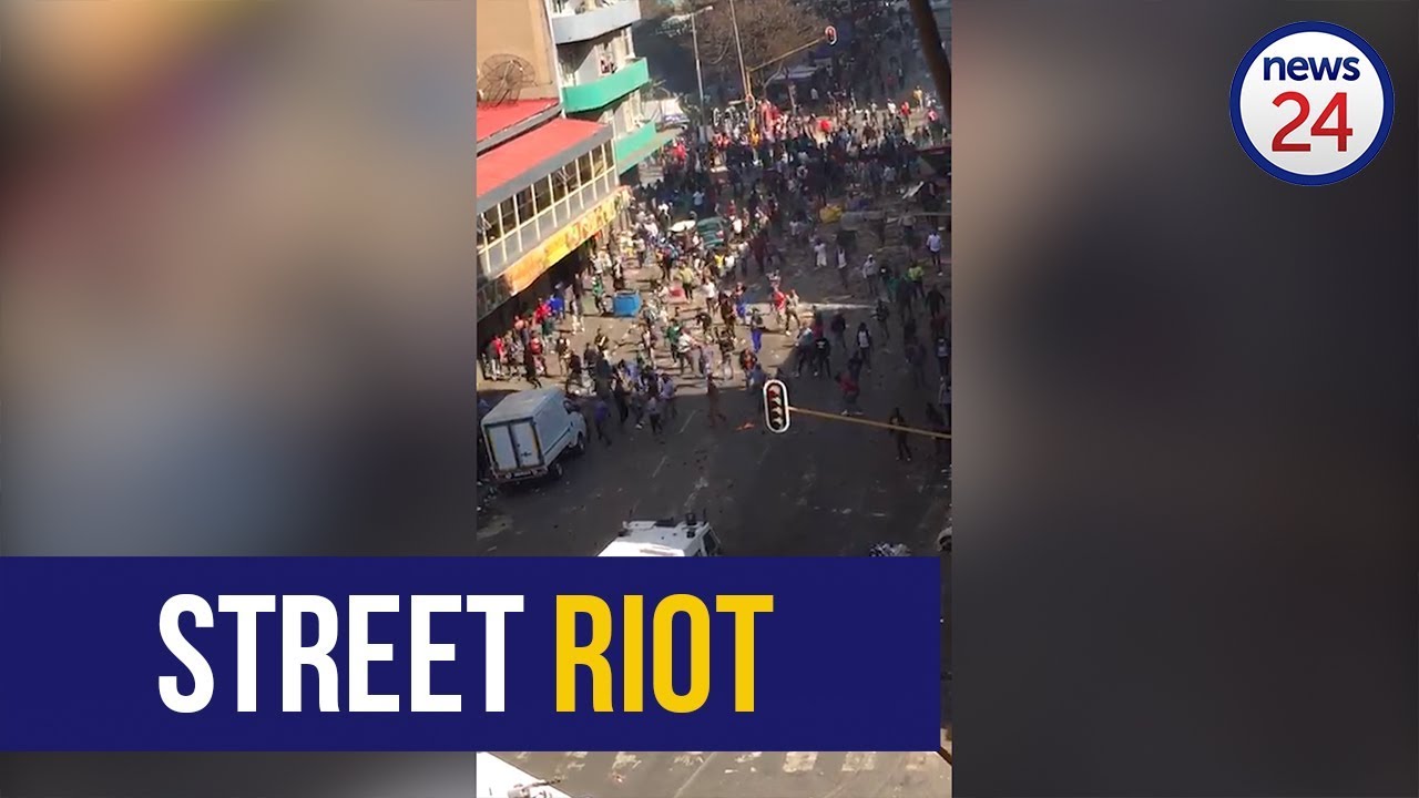 WATCH: Joburg shop owners turn on cops trying to confiscate 'fake' goods