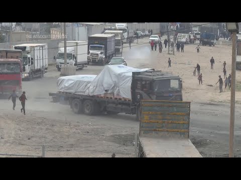 Aid trucks enter