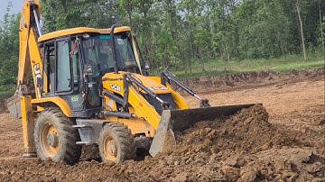 Jcb pushing soil backhoe leveling new track and land machine @roadtrendmachinework