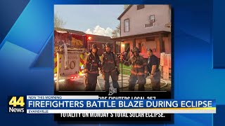 Firefighters battle blaze during eclipse