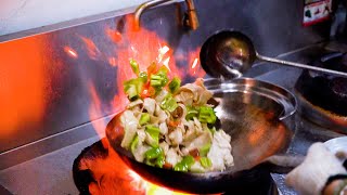 Chinese Street Food -Wok Stir-fried gluten with chili, Xinjiang specialty snacks, grilled mutton