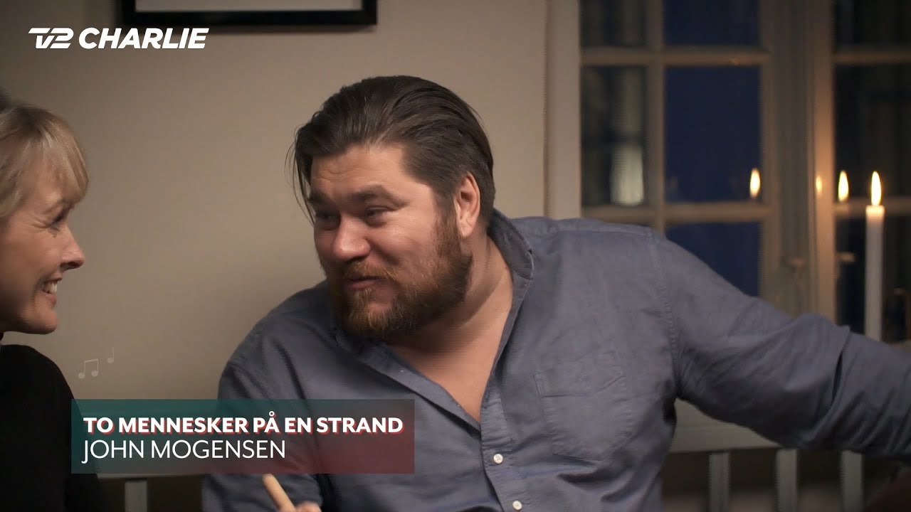 En trekant en sang: To Mennesker På En Strand