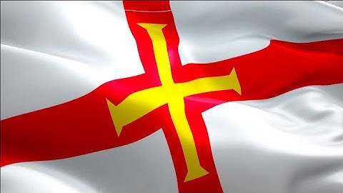 Guernsey flag closeup 1080p Full HD 1920X1080 footage waving in wind. Channel Islands flag Full HD