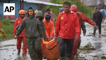 Floods and landslides in Indonesia kill at least 164 people