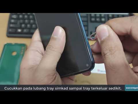 Video: Bagaimanakah cara menukar kad SIM dalam telefon LG saya?