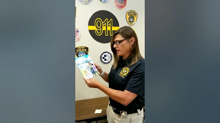 Sgt. Anna Lange reads "I Want to Be a Police Offic...