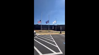 Flags lowered to half-staff at Northern York County Regional Police Department after three office...