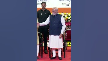 PM Modi unveils RSS centenary stamp and coin