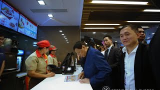 Duterte drops by Jollibee, meets and extends assistance to OFW