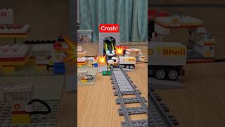 LEGO train hits tanker at crossing near vintage Shell station! 🚂💥