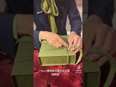 Video Gucci hướng dẫn bạn cách buộc nơ đóng gói hộp túi hiệu... - youtube
