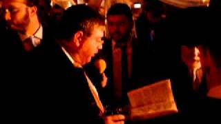 Refael Kruskal reads a blessing. Refael Kruskal reads a blessing.