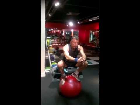 Squats on  swiss ball