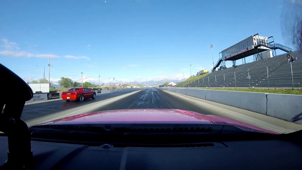 Race girl racing Dodge Challenger in pink Ford Mustang drag racing ...