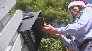Ride along with the US Postal Service delivering holiday packages