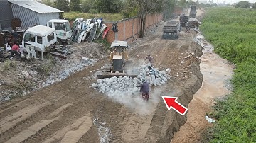 Pouring Skill Operator Control Machine Bulldozer Push Stone sand Making New Road ,Truck Unloading