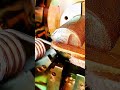 Step-by-step process shaping cylindrical part using lathe precision"