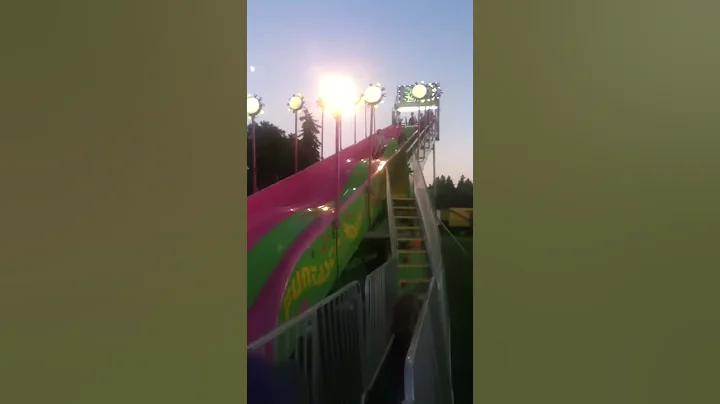 Aimee going down kiddy slide at lakefair 2013