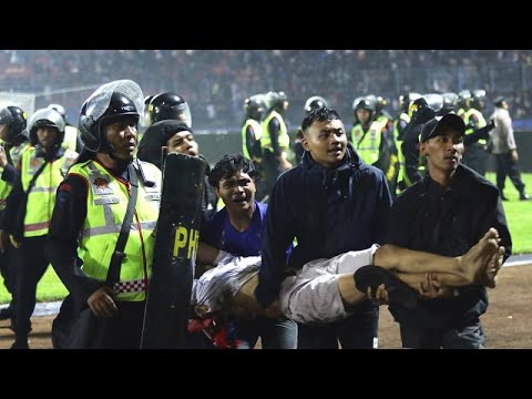 174 dead after fans stampede to exit soccer match in Indonesia