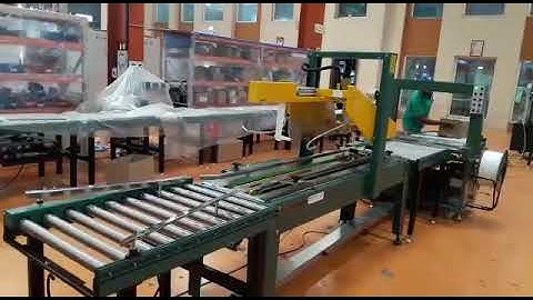 SIGNODE MAKE AUTOMATIC FLAP CLOSING TAPING AND STRAPPING MACHINE (5FRM & MB I)