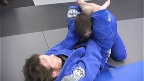 Closed guard overhook triangle setup