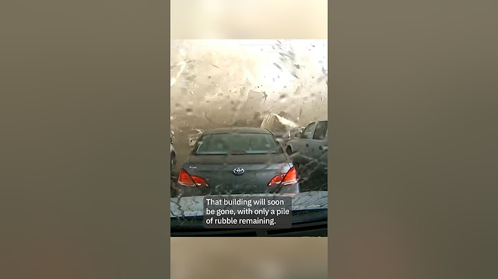 Jaw-dropping dash cam video shows tornado destroying building