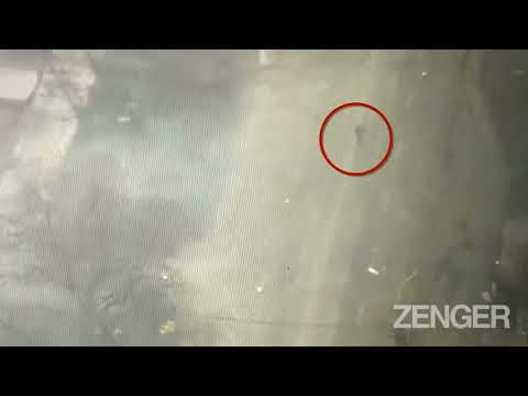 Russian Tank Shoots Lone Ukrainian Civilian With Its Gun As He Walks Down Mariupol Street