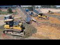 Stronger Bulldozer Spreading Dirt Activities With Big Dump Truck Equipment Heavy Machinery