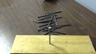 How many nails can you balance on the head of one nail?